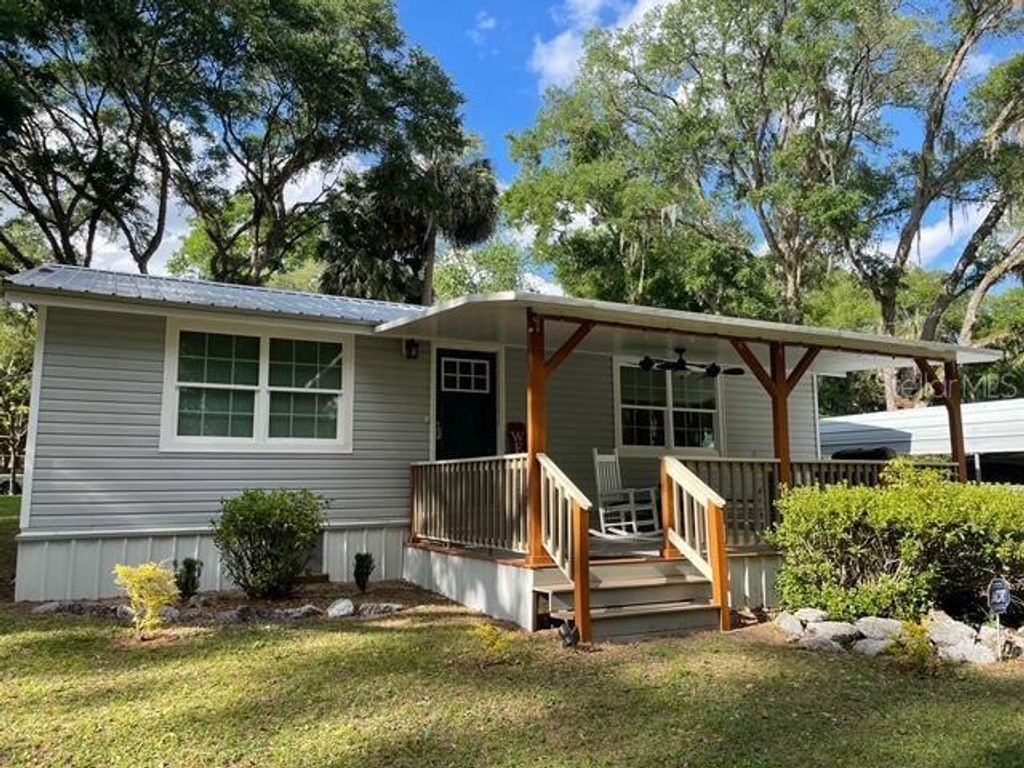 Photo of 20911 NE 142nd Place, Fort Mccoy, FL 32134 (MLS # O6351784)