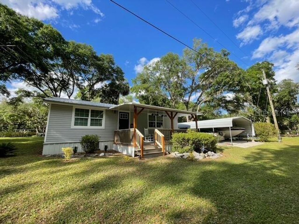 Photo of 20911 NE 142nd Place, Fort Mccoy, FL 32134 (MLS # O6351784)
