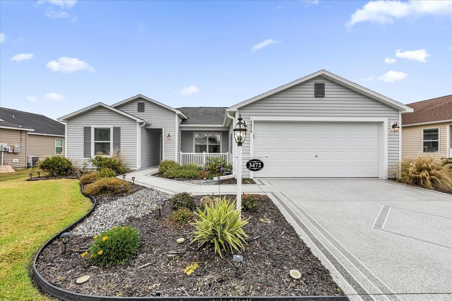 Location, Location, Location!  Welcome to having the opportunity to own this charming Sun Kiss III Model, in The Village of LaBelle North, north of 44, centered between Sumter Landing and Brownwood Paddock Square. This split model home, with guest bedrooms on opposite side of the main bedroom, has been well maintained and is very clean, with many of the upgrades you want to see in a home offering both a convenient location to four champion golf courses: Belle Glade, Bonifay, Evans Prairie, and Havana Country Clubs, while offering luxury upgrades: Crown Molding though out the home, Floridian painted walls, quartz counter tops in the kitchen and bathrooms, complemented with a kitchen tile back splash, double-oven stove, luxury vinyl flooring, with a stunning walk-in tiled shower in the bathroom off of the main bedroom.  The vaulted ceilings in the living area create a feeling of roominess giving you the feeling of having ample space in this cute home.  Most of these upgrades are newly added. The bathroom off of the main bedroom offers double sinks, with the bedroom having a nice size walk in closet. The landscaping has been designed to complement the cottage look of the home, creating a welcoming, entrance and cozy setting for spending time on the covered front porch. The screened in lanai offers the comfort and coolness of Coolaroo Outdoor Shades, and NO kissing lanai.  The landscaping in the backyard creates privacy and a pleasant view while you enjoy being outside, along with a patio for outdoor grilling and entertaining.  This home offers a stained concrete floor in the lanai, back patio, driveway, sidewalk, and front porch.  A bonus is the epoxied garage floor, offering several extra feet for extra room for whatever you need, with a whole house Nova Water Filter System, with new filters.  The home is also conveniently located to local shopping, The Village Health Center, other medical facilities, recreation centers, and don't let me forget to mention friendly neighbors, within this active village!  Not ready to live in the home, it also offers a great area for investors.  The home, at one time, was rented out as a seasonal rental, being booked out one-two years in advance.  The home recently was rented for six months to a family needing a place to live as they built their new home.  There is a market in the Villages for both furnished and non-furnished rentals.  The choice is yours! This is a must-see home, move-in ready home waiting on you!  Schedule your private tour today! (Taxes include both Ad Valorem Taxes and Non-Ad Valrem Assessments and Dining Room Chandelier DOES NOT Convey.)