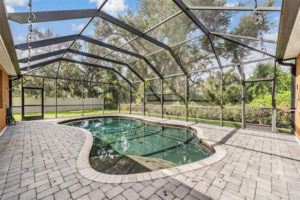 Photo of 7900 Umbrella Pine Way, Sarasota, FL 34241 (MLS # TB8435928)