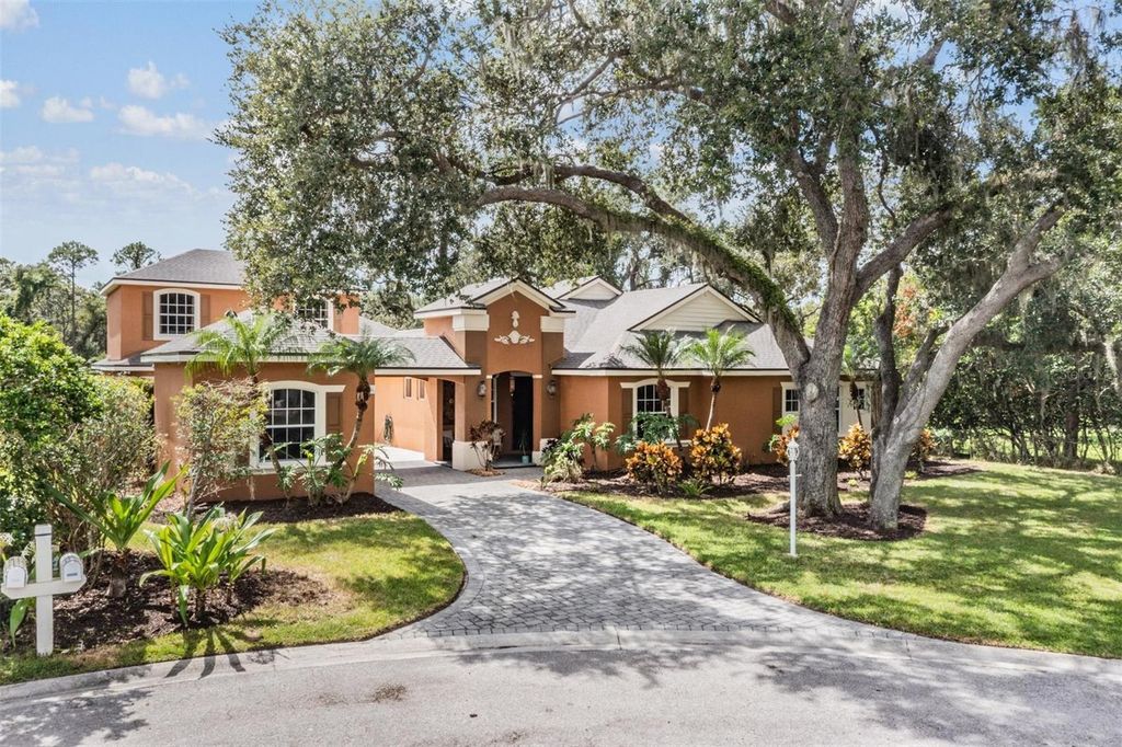 Photo of 7900 Umbrella Pine Way, Sarasota, FL 34241 (MLS # TB8435928)