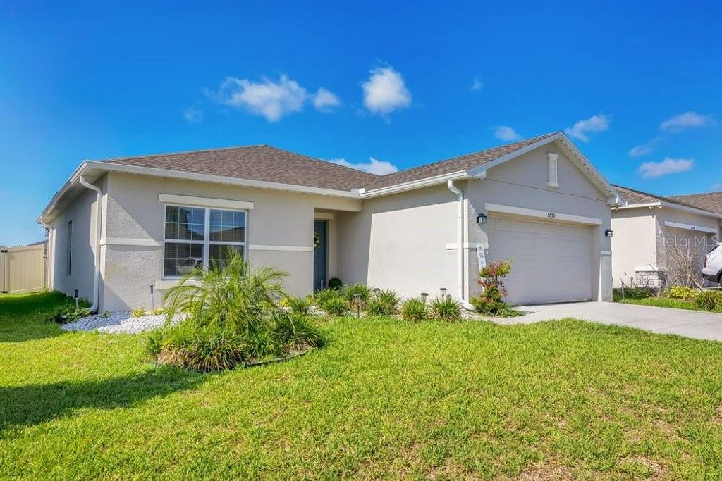 Photo of 5650 Costa Blanca Way, Davenport, FL 33897 (MLS # O6419640)