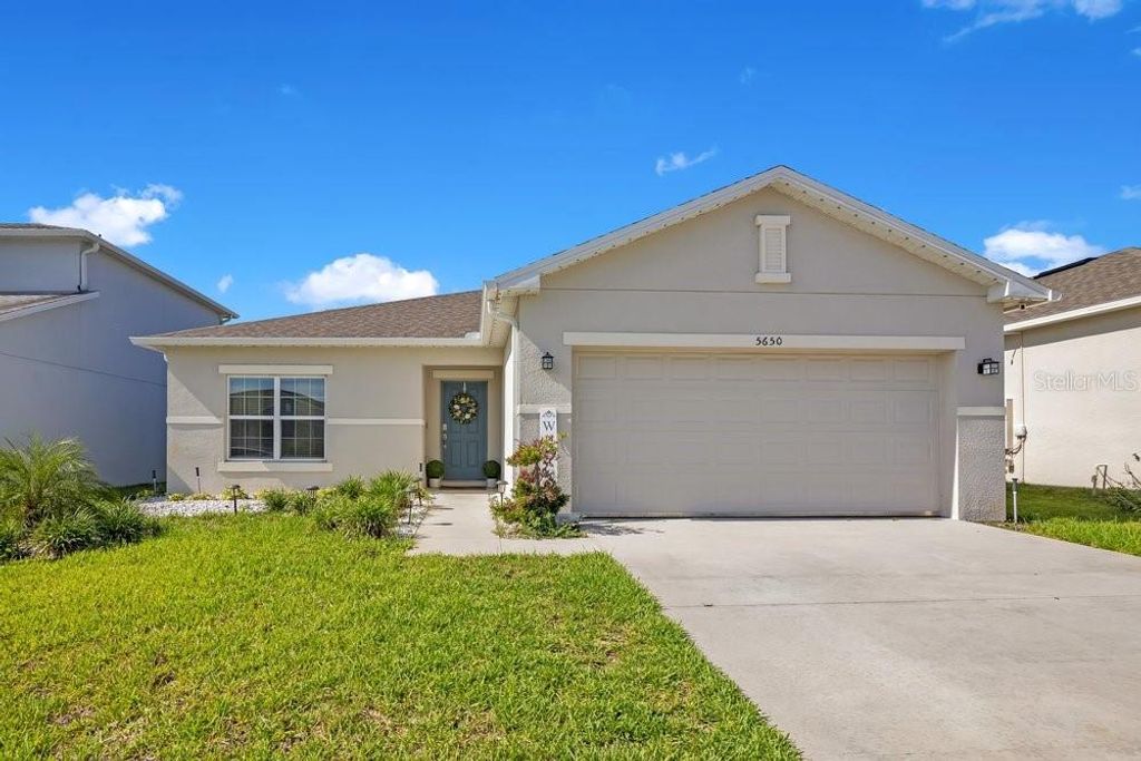 Photo of 5650 Costa Blanca Way, Davenport, FL 33897 (MLS # O6419640)