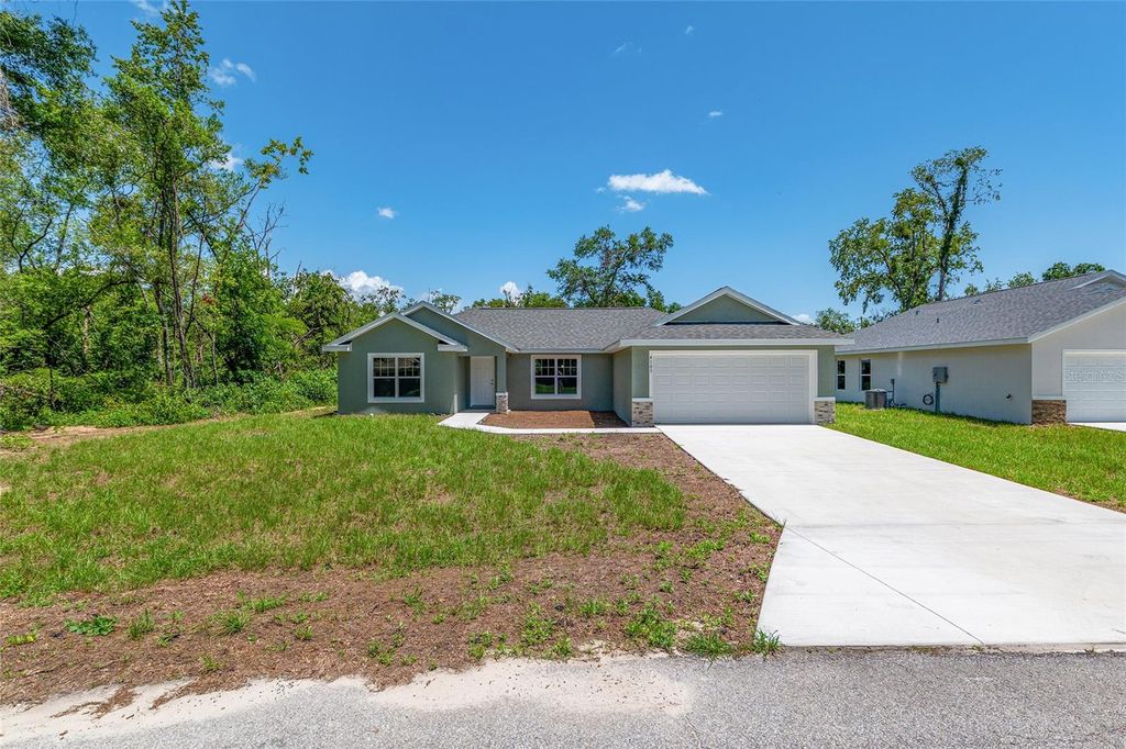 Photo of 10138 SW 130th Court, Dunnellon, FL 34432 (MLS # OM704878)