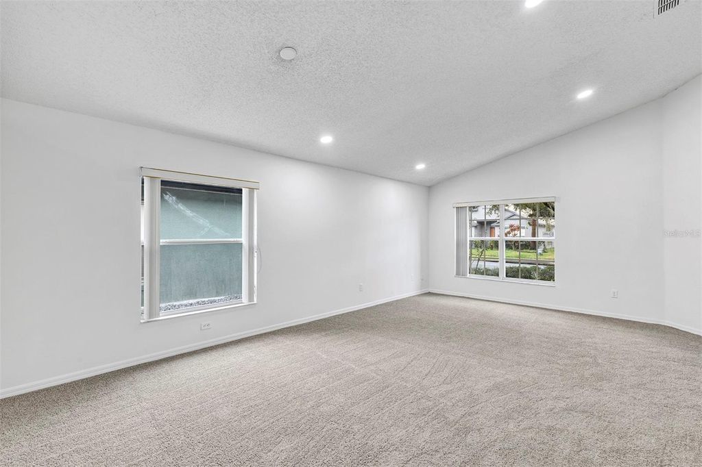 Photo of 4254 Northern Dancer Way, Orlando, FL 32826 (MLS # O6366162)