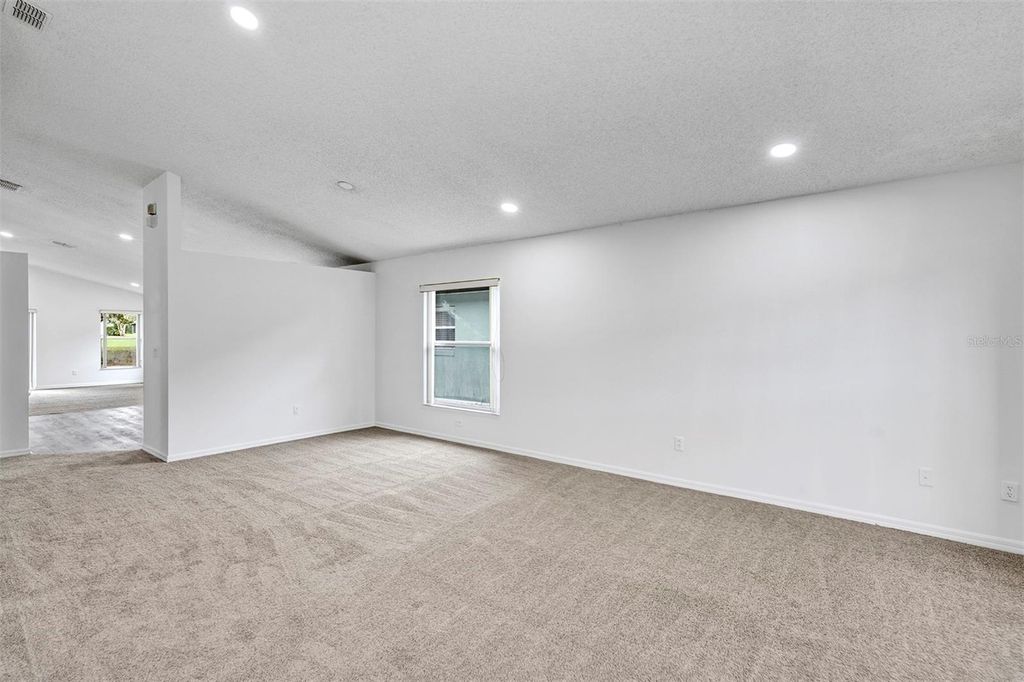 Photo of 4254 Northern Dancer Way, Orlando, FL 32826 (MLS # O6366162)