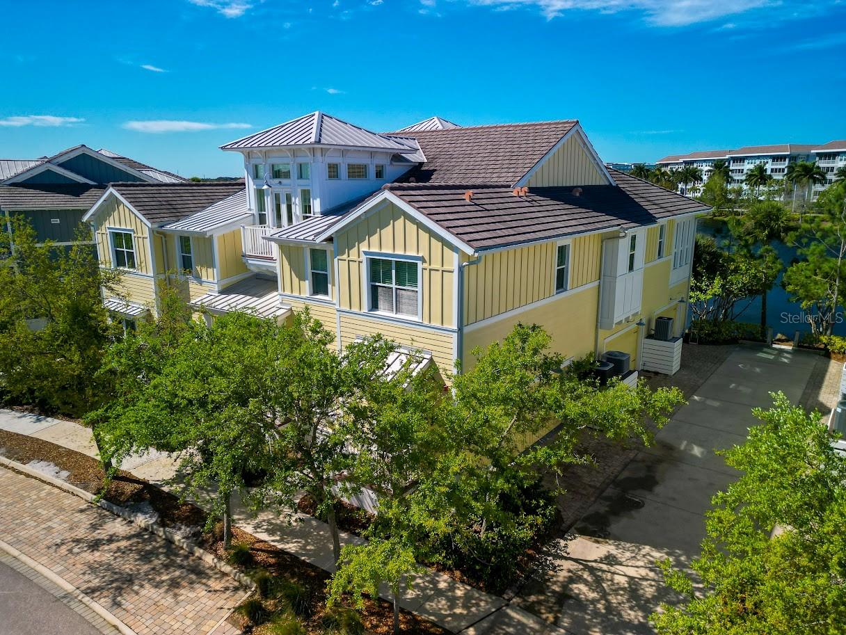 Elegantly appointed! This FULLY FURNISHED 3 bedroom, 3 bathroom, open plan, split bedroom condo is situated in the Resort Community of Harbour Isles on Anna Maria Sound. It features a plethora of upgrades which include crown molding, 8’ solid core doors, wood flooring in the bedrooms and tile laid in a diagonal in the main living areas, plantation shutters, and blinds for added privacy, but which allow the perfect amount of light into the home. The beautiful kitchen features stainless appliances, 42” cabinets with a large granite island. The primary suite is enhanced with breathtaking picturesque views of Sapphire Lake. The bath has dual vanities, an oversized shower, and large soaking tub perfect in which to leisurely unwind . Two additional spacious guest bedrooms, one of which is en-suite with a large oversized bathroom are perfectly located to offer privacy from the main living area of the home. A generous office/den and a fully equipped laundry room complete this home. As a tenant you can enjoy all of the plush amenities Harbour Isles has to offer, which include four heated pools, one of which is a lap pool, a kiddie playground and complementary kayaks, a private sandy beach with lounge chairs plus state of the art fitness center . This gorgeous home is located just a little over a mile from the sugar sand beaches and island charm of Anna Maria Island and less than two miles from the famous Robinson Preserve with over five miles of walking, biking and kayaking. This unique waterfront gated community is located close to all the conveniences of grocery stores and restaurants. ANNUAL RENTAL - AVAILABLE 10/1/2025