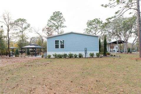 Tiny photo for 7670 NE 97th Court, Bronson, FL 32621 (MLS # S5143545)