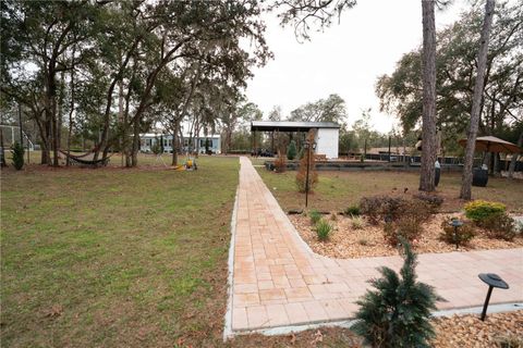Tiny photo for 7670 NE 97th Court, Bronson, FL 32621 (MLS # S5143545)