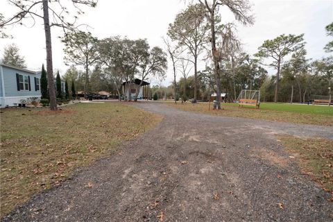 Tiny photo for 7670 NE 97th Court, Bronson, FL 32621 (MLS # S5143545)