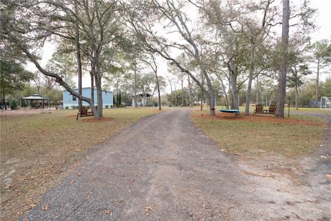 Tiny photo for 7670 NE 97th Court, Bronson, FL 32621 (MLS # S5143545)
