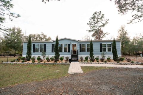 Photo of 7670 NE 97th Court, Bronson, FL 32621 (MLS # S5143545)