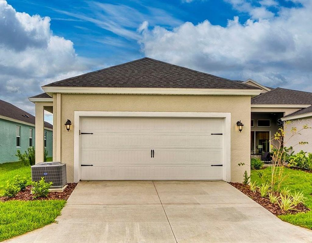 Photo of 3809 LAJUANA BOULEVARD, WESLEY CHAPEL, FL 33543 (MLS # T3412993)