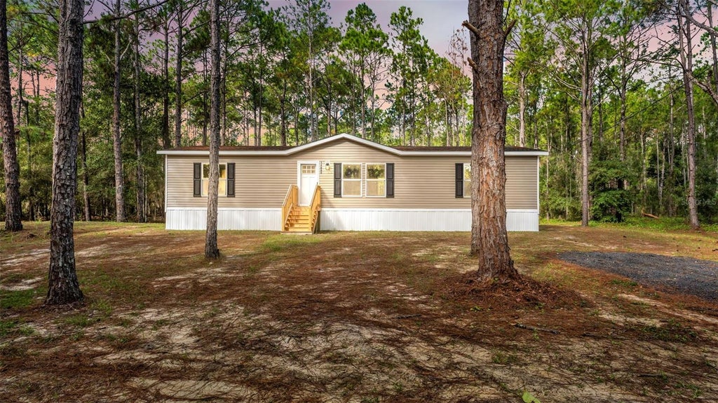 Photo of 14960 Commonwealth Avenue N, Polk City, FL 33868 (MLS # L4966109)
