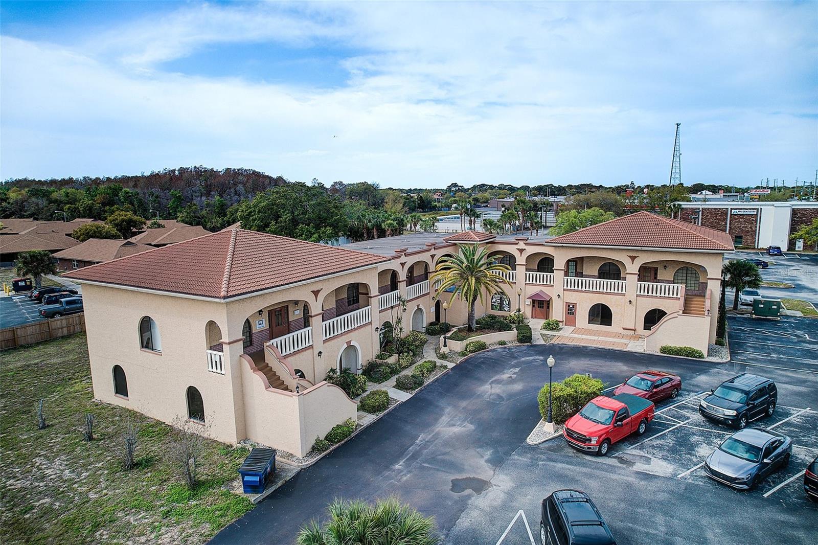 1st floor, 1,300 sq ft office/retail space with prime frontage on State Road 52, offering excellent visibility, easy access, and on-site parking. Features a flexible open layout and close proximity to established businesses, residential communities, and major roadways—perfect for a variety of professional or retail uses.