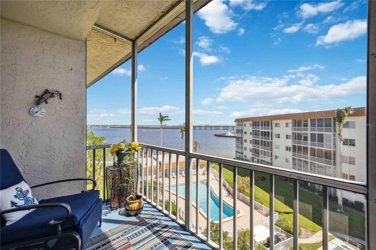 Enjoy front-row views of the Bradenton Regatta and Fourth of July fireworks from your private lanai in this meticulously maintained 2-bedroom, 2-bath condo in the heart of downtown Bradenton.
Perched on the 5th floor of the sought-after waterfront community at River Oaks. This light-filled home offers sweeping views of the Manatee River from both the main living area and the spacious primary suite. The screened lanai provides the perfect spot to relax and take in the fireworks and annual regatta.
Step inside to find a thoughtfully designed floor plan with an open-concept living and dining area, an eat-in kitchen with a convenient pass-through, and generous storage throughout—including a large walk-in closet in the primary suite. Recent updates include a newer HVAC system and updated windows, offering comfort and peace of mind.
Community amenities include a heated pool, clubhouse, recreation room, and covered parking. You're just steps from downtown Bradenton’s Riverwalk, restaurants, shops, and cultural attractions.
Whether you're looking for a full-time residence or a seasonal escape, this turnkey condo offers the best of Florida living—with a front-row seat to the city’s most iconic waterfront events.