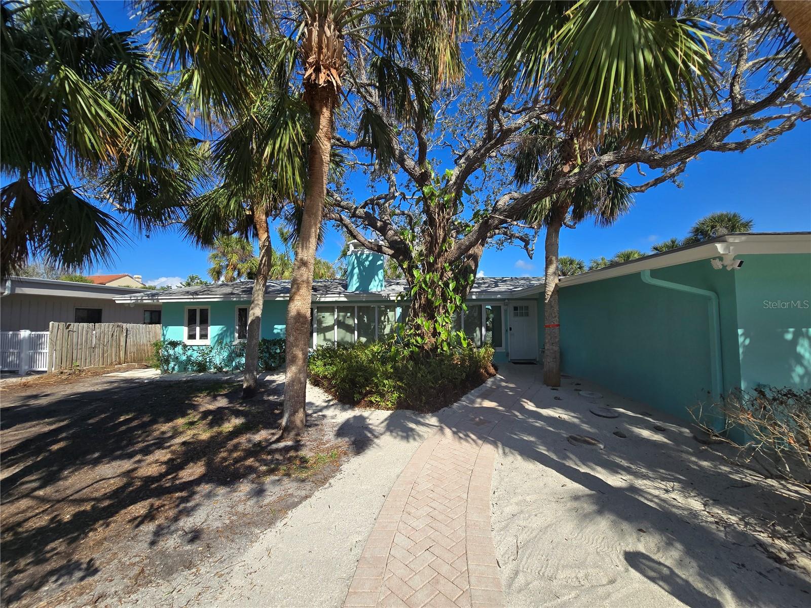 Discover an extraordinary opportunity to own a stunning bayfront estate on the breathtaking shores of Casey Key. Nestled along 121 feet of prime waterfront, this 3-bedroom, 3-bath residence invites you to embrace the best of coastal living. Whether you choose to update, expand, or design a brand-new architectural masterpiece, the possibilities are endless on this expansive property. Casey Key is a rare Gulf Coast treasure, an eight-mile-long barrier island known for its unparalleled privacy, exclusive homes, and unspoiled natural beauty. With deeded beach access just steps away, you can stroll along the secluded, soft-sand shoreline, savoring the tranquility of the Gulf of America's crystal-clear waters. On the east side of the property, your private boat dock provides direct access to Blackburn Bay and the Sarasota Intracoastal Waterway, perfect for boating enthusiasts looking to explore the waterways in style. Tucked away yet easily accessible, this sought-after location offers seamless travel from Tampa, Sarasota, Venice, and Ft. Myers International Airports. Wake up to serene bay views, spend your days soaking in the Florida sunshine, and end each evening with spectacular sunsets over the Gulf of America. Your coastal dream home awaits at 2812 Casey Key Rd—a rare opportunity to own a piece of paradise in one of Florida’s most coveted waterfront communities. Schedule your private showing today!