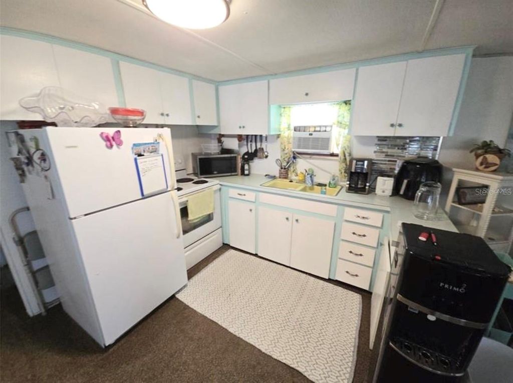 Photo of 707 49th Avenue Drive W, Bradenton, FL 34207 (MLS # TB8485978)