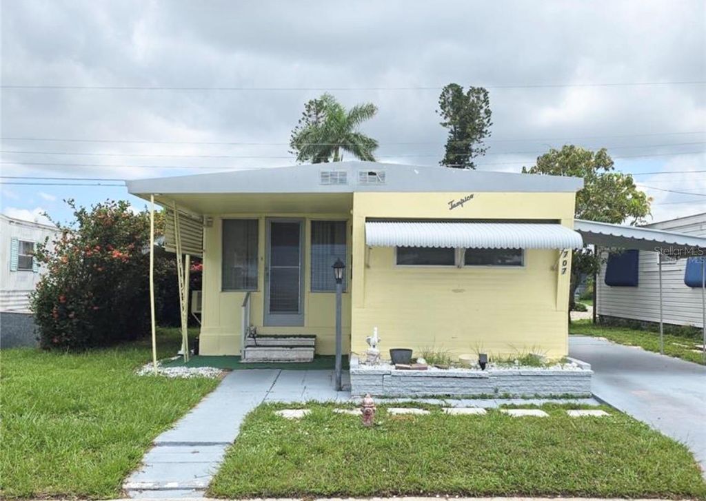 Photo of 707 49th Avenue Drive W, Bradenton, FL 34207 (MLS # TB8485978)