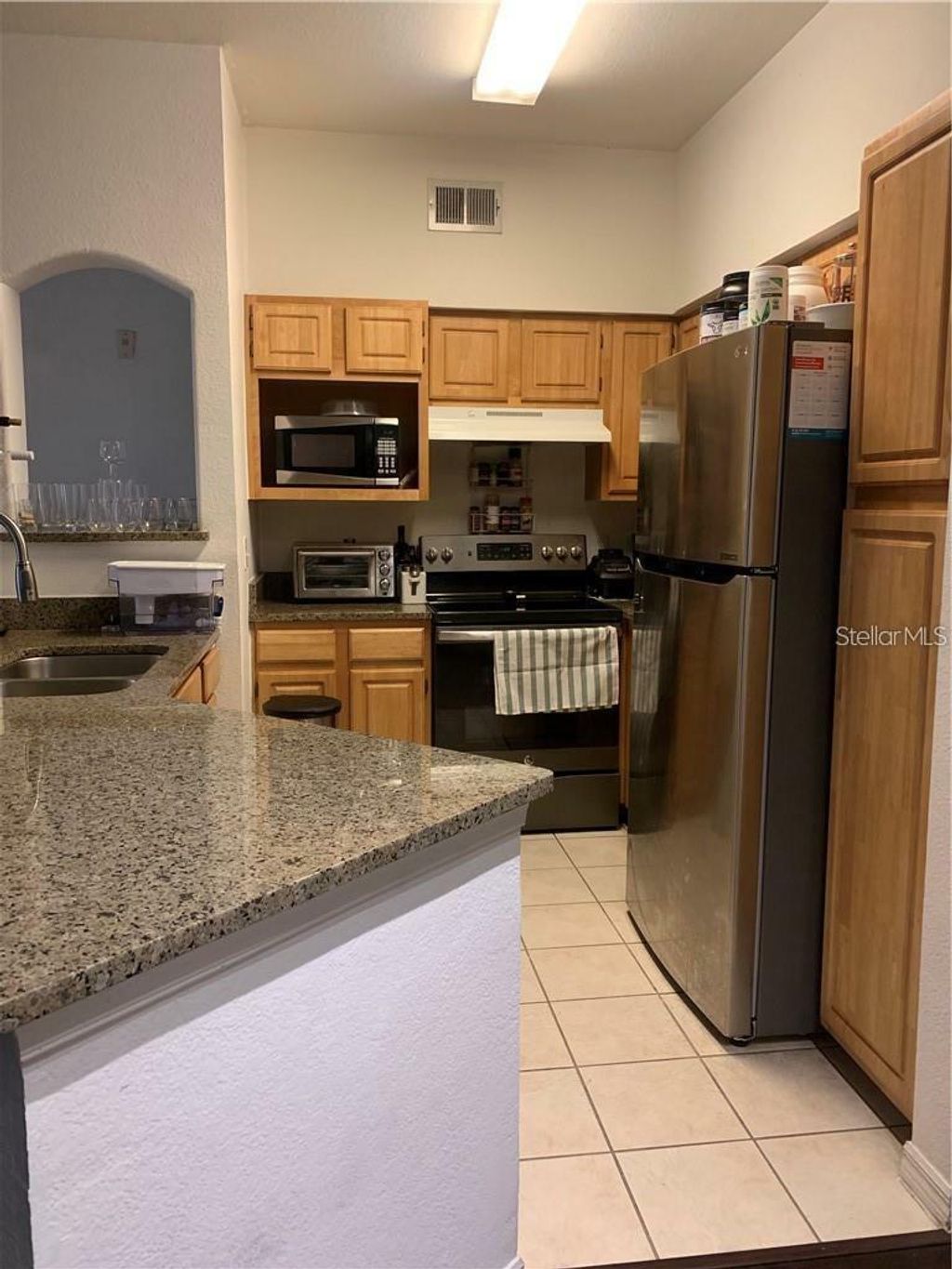 Photo of 3446 Soho Street #101, Orlando, FL 32835 (MLS # O6389842)