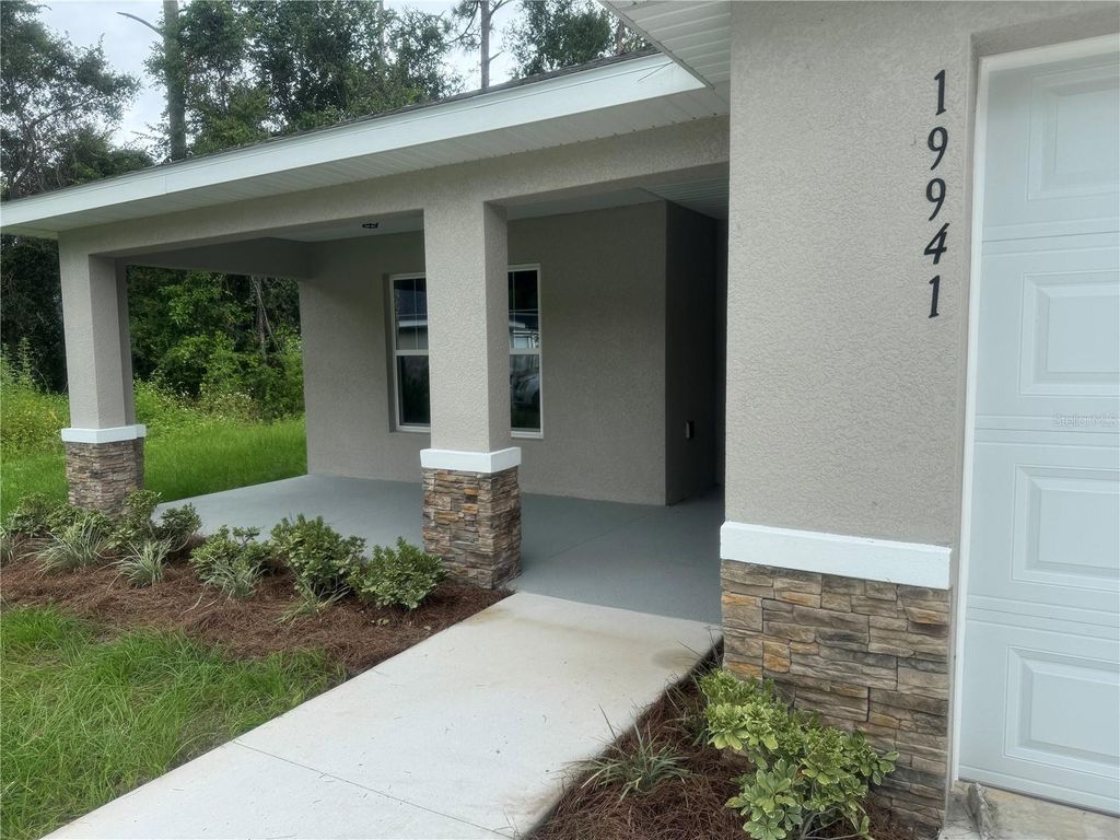 Photo of 19941 SW 96th Lane, Dunnellon, FL 34432 (MLS # OM703598)