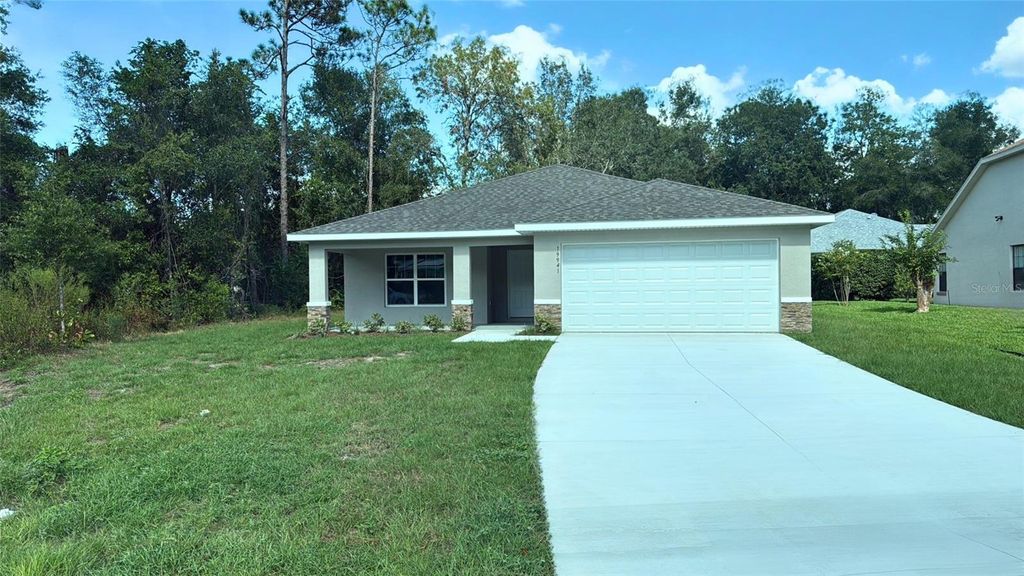 Photo of 19941 SW 96th Lane, Dunnellon, FL 34432 (MLS # OM703598)