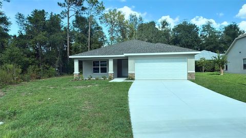 Photo of 19941 SW 96th Lane, Dunnellon, FL 34432 (MLS # OM703598)