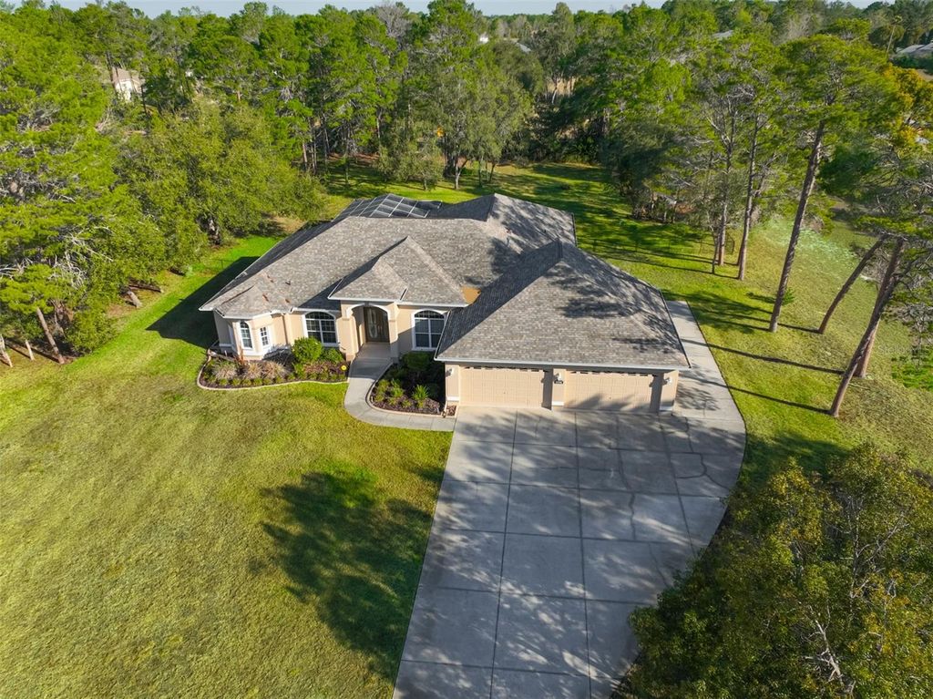 Photo of 11235 Warm Wind Way, Weeki Wachee, FL 34613 (MLS # TB8481889)