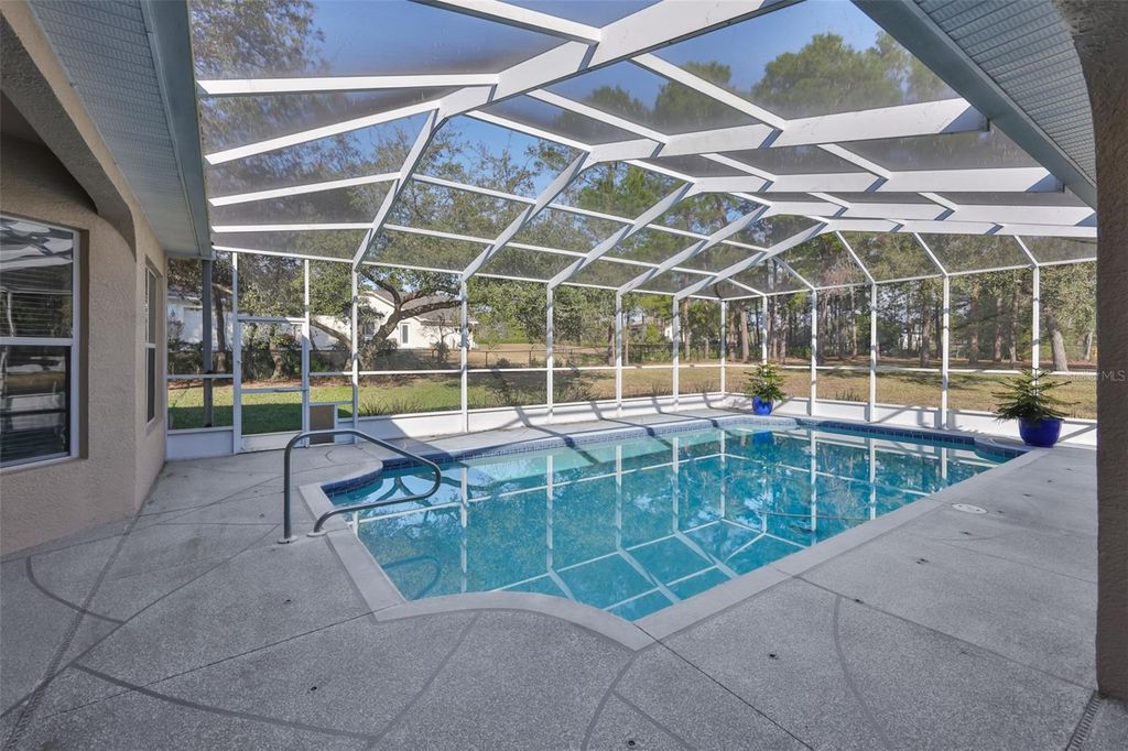 Photo of 11235 Warm Wind Way, Weeki Wachee, FL 34613 (MLS # TB8481889)