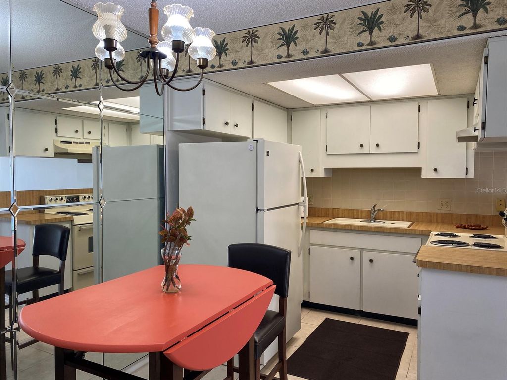 Photo of 4377 Tahitian Gardens Circle #G, Holiday, FL 34691 (MLS # TB8501813)