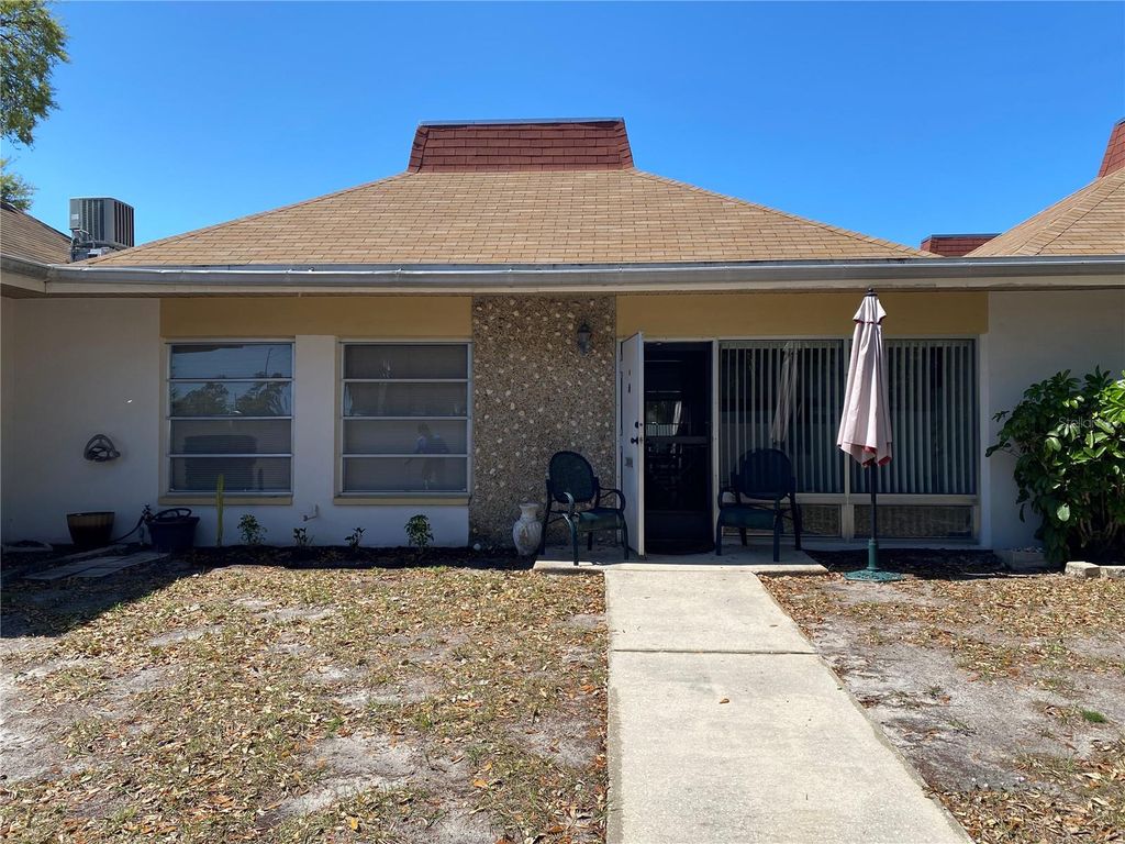 Photo of 4377 Tahitian Gardens Circle #G, Holiday, FL 34691 (MLS # TB8501813)