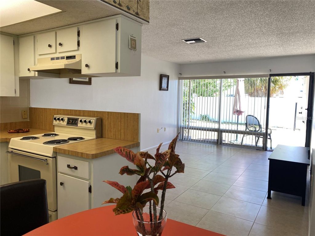 Photo of 4377 Tahitian Gardens Circle #G, Holiday, FL 34691 (MLS # TB8501813)