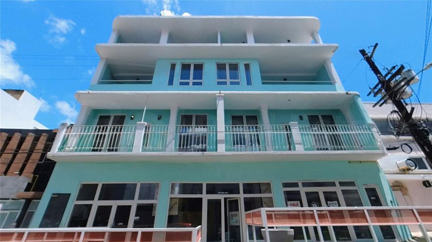 This exceptional mixed-use property is in the heart of the vibrant Miramar district, home to many trendy dining establishments. The area is being revitalized, with numerous old apartments being transformed into chic, modern living spaces, making it a prime location for investment. The building is conveniently located close to all amenities and is currently utilized as a short-term rental unit, boasting a remarkable occupancy rate and profitability.

This property offers seven units: one retail space, five three-bedroom, two-bathroom apartments, and one two-bedroom, two-bathroom apartment. With a sprawling total area of approximately 12,000 square feet, the building is fully furnished with all appliances. Additionally, seller financing options are available, making this an enticing opportunity for prospective buyers.