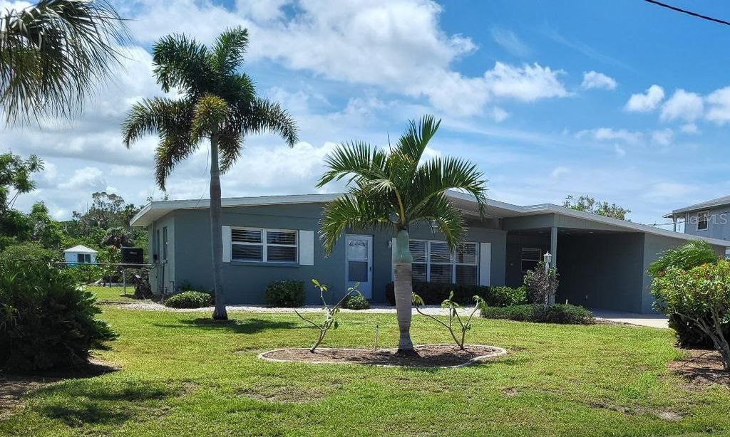 Photo of 828 Blue Heron Boulevard, Ruskin, FL 33570 (MLS # TB8436591)