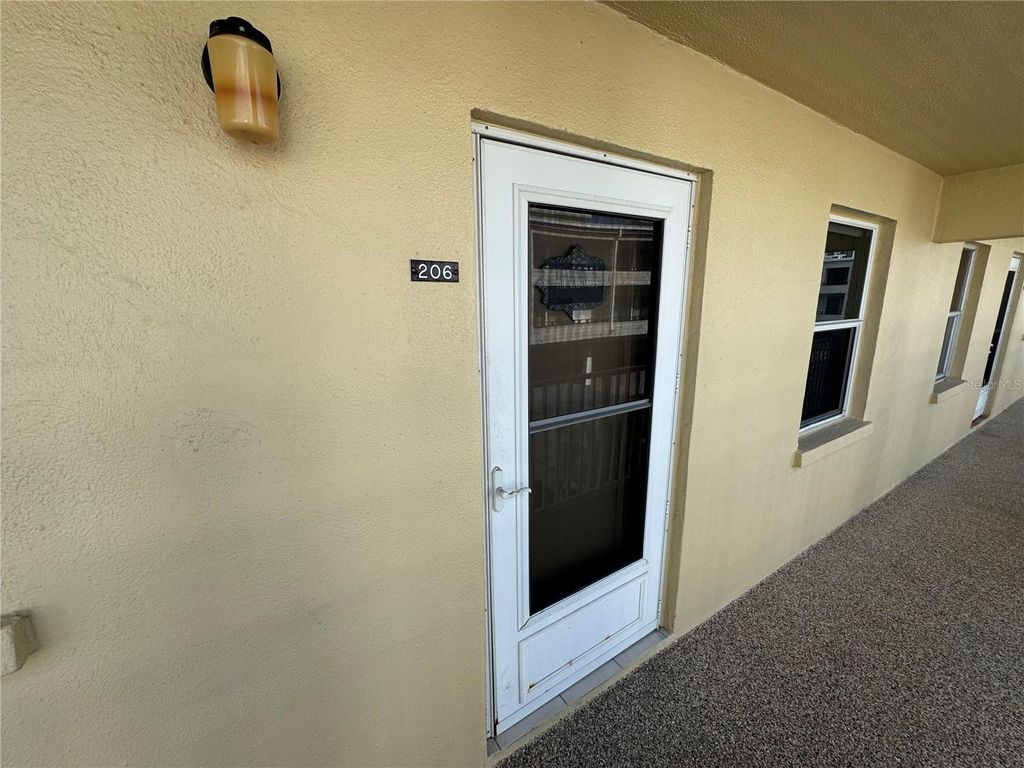 Photo of 1400 Tarpon Center Drive #206, Venice, FL 34285 (MLS # N6141990)