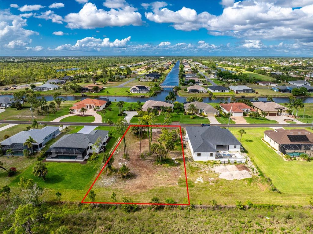 Photo of 1185 Boundary Boulevard, Rotonda West, FL 33947 (MLS # D6146912)