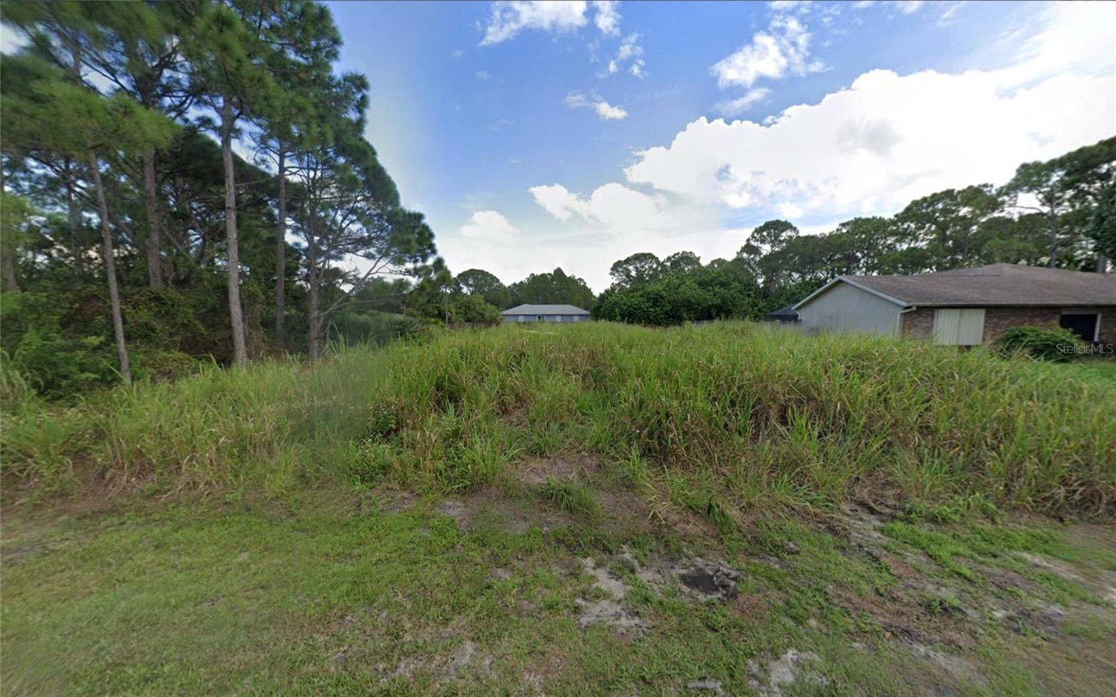 Discover your slice of Florida living in this beautiful homesite located in the growing community of Palm Bay! This spacious vacant lot offers the perfect opportunity to build your dream home in a peaceful residential neighborhood surrounded by new construction and natural beauty. Enjoy the freedom of no HOA and the convenience of being just minutes from shopping, dining, schools, and major roadways including I-95 and the Bayside Lakes area. The property is also a short drive from local parks, golf courses, and the stunning beaches of the Space Coast. Whether you’re a builder, investor, or future homeowner, this lot provides the ideal setting for your next project or forever home.
