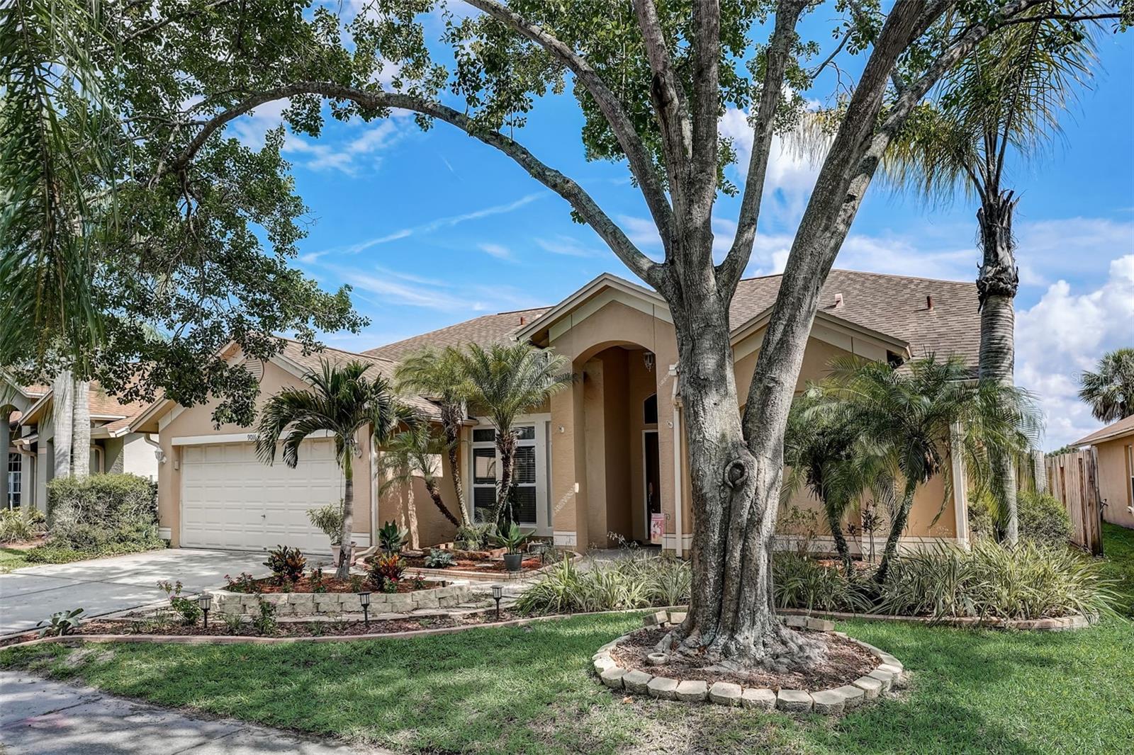 Best location in Westbay! Gorgeous lot with pond view! Move right into this lovely home with all bamboo and tile floors, inground caged pool with composite surface, and pool sweep. Large covered lanai off pool. Living room has sliders to the lanai and view of the pond. Dining room off the living room. Kitchen has granite counters, wood cabinets, tile backsplash, and stainless appliances. Breakfast bar that opens to the family room. Breakfast nook off the kitchen looks out on the pool area and has a pond view. Master suite has a large walk-in closet and ensuite bath with soaking tub, separate shower, dual sinks, linen closet and tile floors. Split bedroom plan with secondary bedrooms and pool bath off the family room. Hall bath has upgraded fixtures and tile tub surround. Bath opens to the pool. Most windows replaced with double pane Anderson windows. Laundry room off kitchen has storage cabinets, washer and dryer, which stay. Garage has storage and door opener. Ceiling fans in most rooms. All walk-in closets have built-in organizers. Front door replaced with an upgraded door with cut glass inset. Roof, AC and water heater have all been replaced. Community has a park/playground with picnic area, and a separate dog park. Convenient location just 10 minutes to Citrus Park Mall, Veteran's Xway, Oldsmar. 5 minutes to shopping, schools, churches. 15 minutes to TIA, Westshore, and International Mall.