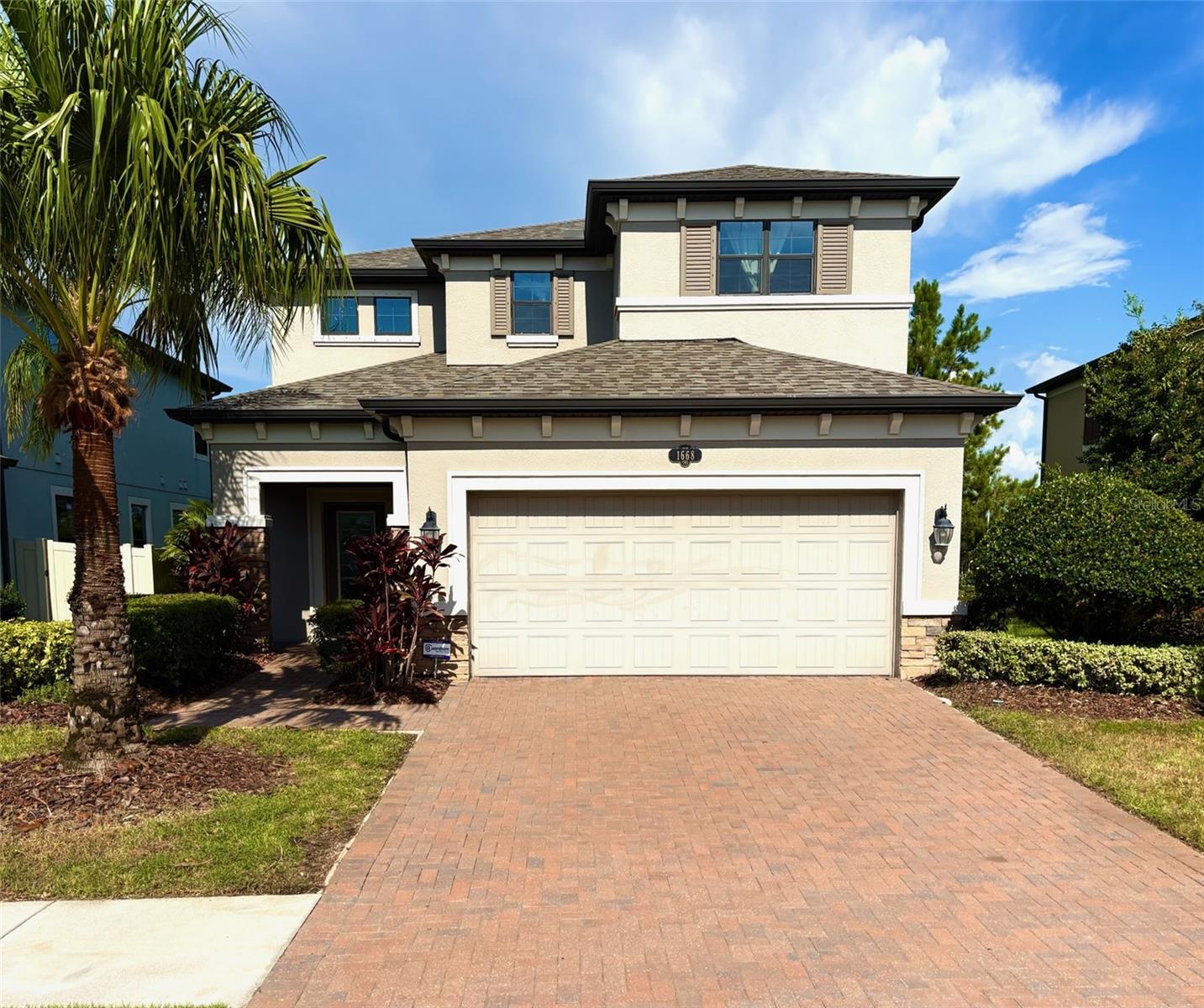 Welcome to this stunningly beautiful home in the highly desirable neighborhood of Long Lake Ranch, being offered by the original owners! A former model home, it boasts unique wall and ceiling features that set it apart and give it a unique and special feel throughout, setting it apart from all the other homes in the neighborhood! With 2,143 square feet of living space, this two-story home offers three bedrooms, three bathrooms, and a versatile downstairs office. The open-concept kitchen features granite countertops, a built-in wine rack and a large island that’s perfect for quick breakfasts or hosting friends and family. All bedrooms are located upstairs along with custom cabinetry and storage on the landing, and a spacious laundry room. The primary bedroom features dual closets, beautiful tray ceilings with built in lighting and also has wonderful views of the lake. Step outside to a screened-in patio that opens to a pavered gathering area complete with an outdoor fireplace—an ideal spot for cozy fall and winter evenings. The backyard looks directly out over the peaceful waters of Long Lake, offering serene views and a constant connection to nature. Just 100 yards from your doorstep are all the neighborhood amenities, including a resort-style pool, basketball courts, playgrounds, dog parks, and miles of scenic walking trails. The home is move-in ready and located just one minute from State Road 54, providing quick access to the Suncoast Parkway and I-75. Whether you’re headed to nearby hospitals, beaches, or shopping, everything is just a short drive away.
This home is an exceptional value and is PRICED TO SELL. As a bonus, the seller is offering a $2,000 credit toward interior paint so you can personalize it to your taste. Don’t miss your chance to own one of the best values in Long Lake Ranch—schedule your showing today before it’s gone! ROOF=2025, includes a hurricane window protection system, an epoxy coated garage floor, NEW garage door opener, NEW microwave, and a security system!