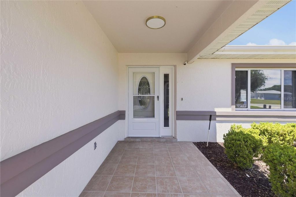 Photo of 6118 SW 100th Loop, Ocala, FL 34476 (MLS # OM724067)