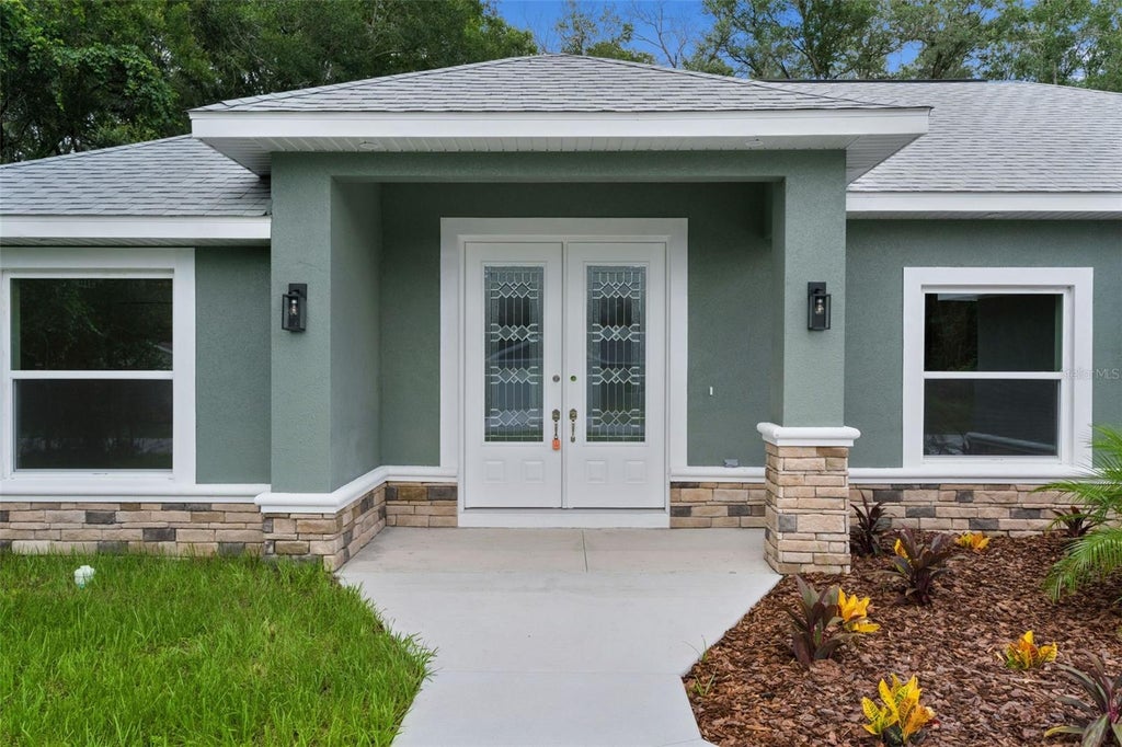 Photo of 8277 SE 158th Street, Summerfield, FL 34491 (MLS # OM729666)