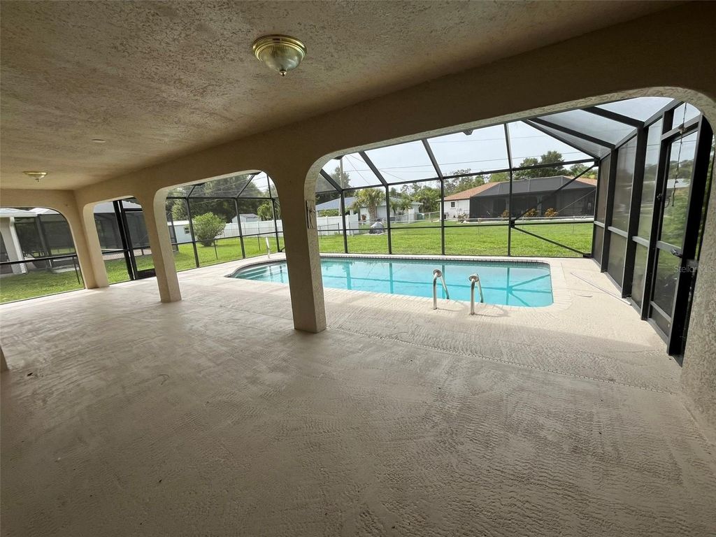 Photo of 18171 Edgewater Drive, Port Charlotte, FL 33948 (MLS # C7516481)