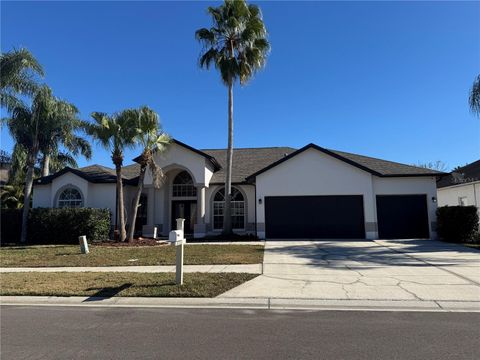 Photo of 28724 Hanging Moss Loop, Wesley Chapel, FL 33543 (MLS # TB8466457)