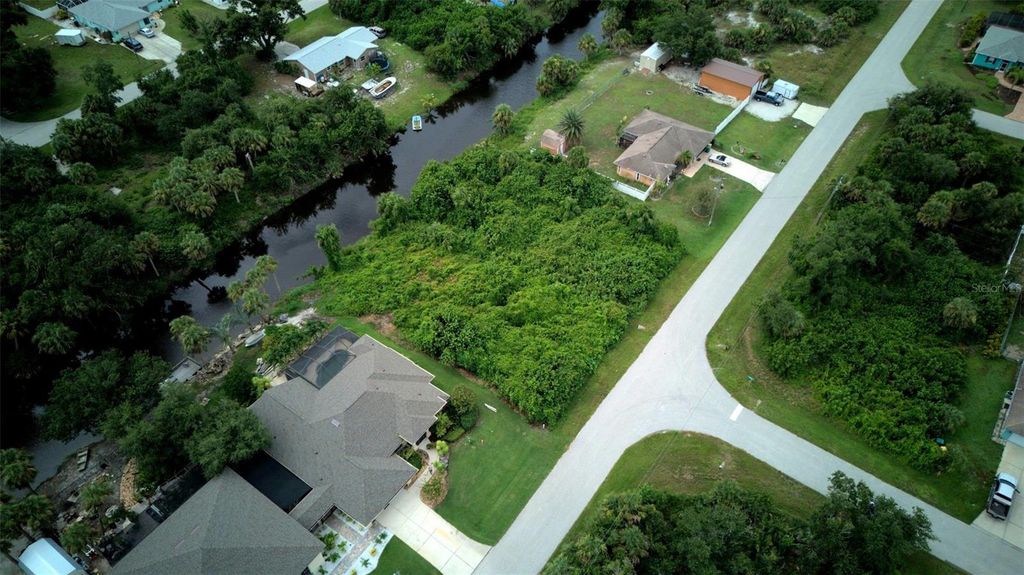 Photo of 7432 Memorial Drive, Port Charlotte, FL 33981 (MLS # A4661781)