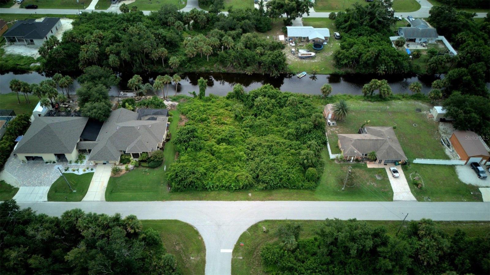 Wake Up to a Waterfront Sunrise!
Invest in Your Own Freshwater Canal Lot in Port Charlotte, FL. Flood zone X, so no flood insurance will be required by your builder/lender!
Experience Florida living at its finest—imagine fishing or kayaking from your own backyard in this peaceful East Englewood neighborhood! This freshwater canal lot offers a rare blend of tranquility and accessibility:
Waterfront Sunrises right outside your future home
Fun Fishing & Kayaking from your backyard
Located in a quiet residential area with public water and electric available, septic needed.
Enjoy easy access to local attractions:
Multiple golf courses within a few miles
4 miles to Cape Haze Pioneer Trail
5 miles to Ann Dever Regional Park with fitness center, pool, and hiking/biking trails
8.5 miles to Englewood Beach
13 miles to Boca Grande – pristine beaches & world-class fishing
63 miles to Southwest Florida International Airport (RSW)
Surrounded by great dining, shopping, and recreational activities—this is your chance to build your dream home or invest in a piece of paradise!