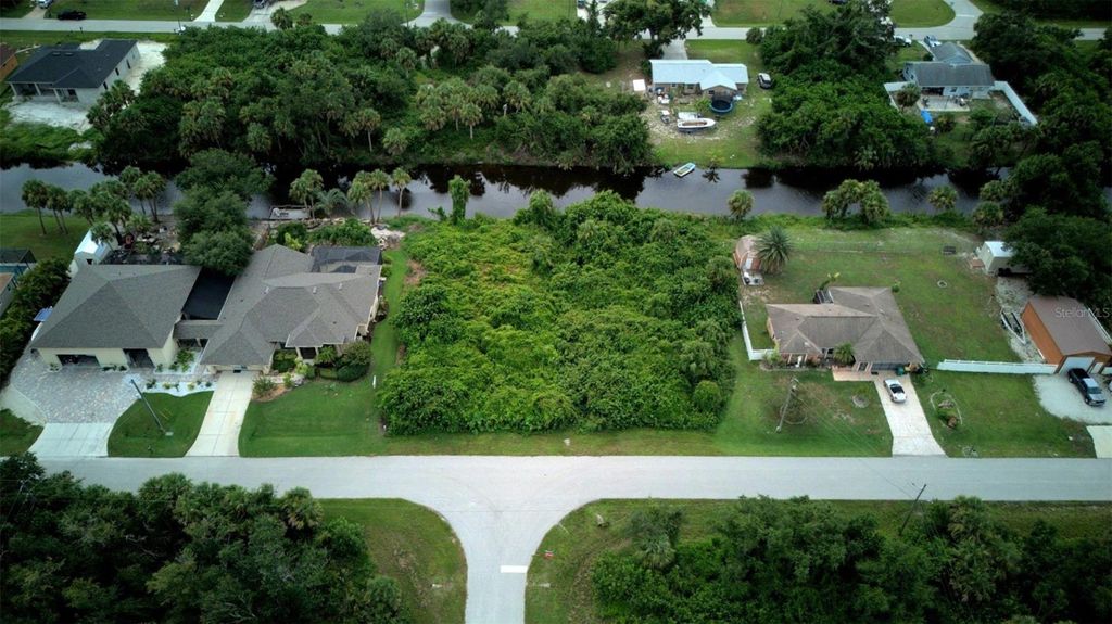 Photo of 7432 Memorial Drive, Port Charlotte, FL 33981 (MLS # A4661781)