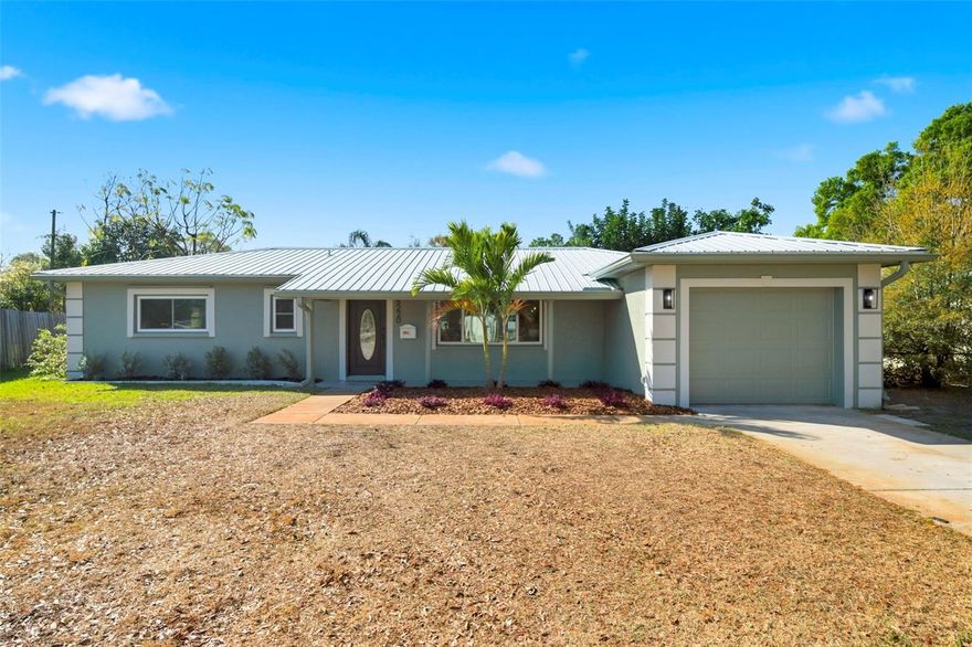 Completely updated and move-in ready, this beautiful 3-bedroom, 2-bath, 1-car garage single-family home in St. Petersburg offers the perfect blend of style, comfort, and durability with solid block construction and a long-lasting metal roof! Inside, you'll find fresh interior and exterior paint and attractive LVP flooring throughout the main living areas, creating a modern and welcoming feel. The spacious open-concept layout seamlessly connects the living room, kitchen, and dining area, making it ideal for everyday living and entertaining. The stunning kitchen features stone countertops, stainless steel appliances, a gorgeous tile backsplash, recessed lighting, a large island with barstool seating, and abundant cabinet and counter space. The dining room is conveniently located just off the kitchen, perfect for gatherings. The primary suite offers a relaxing retreat with an en-suite bath that includes dual sinks and a beautifully tiled walk-in shower. Step outside to enjoy the large fenced backyard with a storage shed, offering plenty of space for outdoor activities, pets, or future additions. The home also includes a 1-car garage and is ideally situated in a non-flood zone, while still being centrally located close to parks, shopping, dining, entertainment, and vibrant downtown St. Petersburg. Don’t miss your opportunity to own this beautifully updated home in an incredible location, schedule your private showing today!