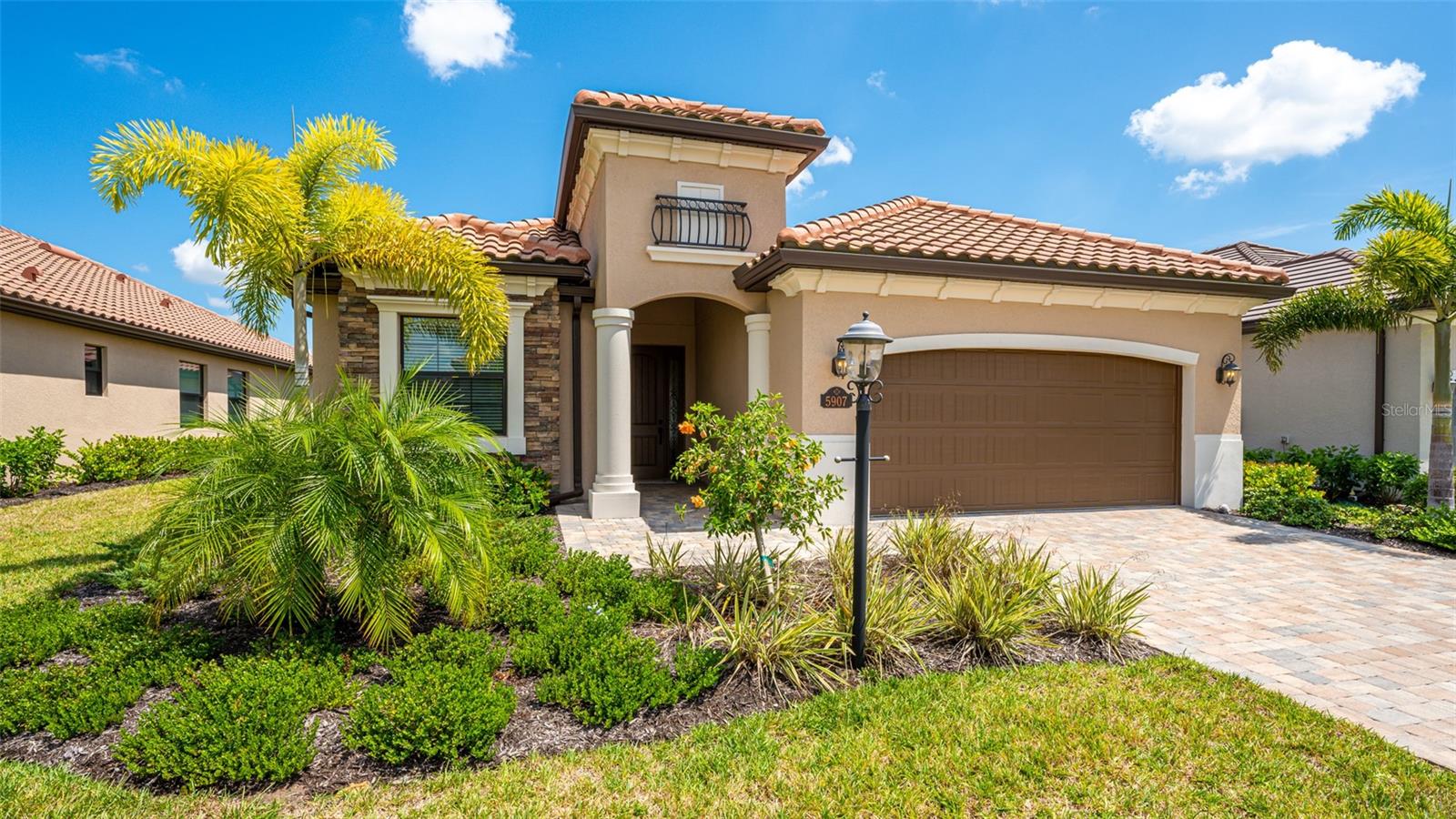 Enjoy the Florida Lifestyle in this stunning Executive Home in the Gated Golf Community of Lakewood National. This home has it all! Plenty of room for the whole family in this 4 bedroom, 2 bathroom home, that lends itself to fun and entertainment with an open floor plan and upgrades galore. Vaulted ceilings, granite counter tops, dual sinks, soaking tub, private pool and spa, gorgeous outdoor kitchen with built in grill. Enjoy the magnificent view of the lake as you enter the front door and watch the golfers navigate the fun and challenging course from your private lanai with pool and spa. This home has coastal contemporary furnishings in a soothing color palate . High season rate is $12,000 per month (Dec.- April). Navigate the new 36 hole Arnold Palmer designed unique and challenging golf courses and driving range. AMENITIES INCLUDE CLUBHOUSE WITH RESTAURANT AND BAR, FITNESS CENTER, RESORT STYLE SWIMMING POOLS WITH OUTDOOR GRILLE AND POOLSIDE SERVICE, A FULL SERVICE SPA FOR MASSAGES AND FACIALS, 8 TENNIS COURTS, PICKLE BALL AND MORE! Golf Membership transfer available for purchase. $75.00 monthly food & beverage minimum required at on-site tiki bar/ Restaurant (alcohol excluded). Easy access to I-75, A+ schools, local shopping and dining, University Parkway, Sarasota Airport and all that Lakewood Ranch has to offer.
