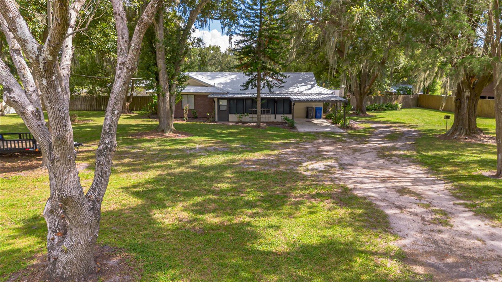 Welcome to your serene retreat at 9349 Edison Rd a charming 2-bedroom, 1.5-bathroom single-family home offering 1,288 sqft of cozy living on a spacious 1-acre lot. This well-maintained 1974 ranch-style property features an enclosed front porch, multiple sheds, well maintained land and a metal roof, with modern updates including hvac 3 yrs old. Nestled in a peaceful Lithia, it’s perfect for those seeking tranquility while remaining close to major highways, shopping, and dining in Central Florida. Make this property your own! Schedule a showing today.
