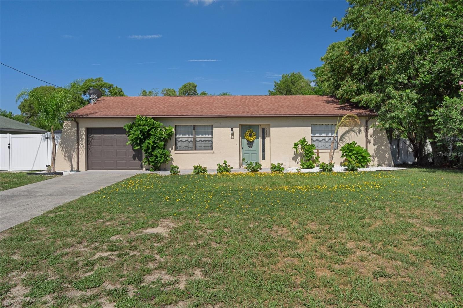This fully updated and move-in ready 2 bed/1 bath POOL home situated on 0.2 acres in the heart of Spring Hill, Florida is the ideal starter home, investment, or retirement property!
A tropical oasis that offers all of the modern amenities you need for a cozy and comfortable space. The entire home has been thoughtfully updated featuring new interior paint, upgraded bathroom, and a beautifully remodeled kitchen with granite countertops and all stainless steel appliances.
Step outside to the fully fenced-in backyard and you'll find your own private retreat. Pavers span the screened-in back porch, walkway, and pool deck, and island-inspired landscaping gives it a true Florida vibe. The screened-in pool area is separated from the back porch, which is perfect for families with young kids or pets. Plus, the side yard has millings down, offering additional parking for boat trailers, campers, extra vehicles, or yard equipment.
Conveniently located in a quiet neighborhood just minutes from shopping, restaurants, hospitals, and entertainment. Enjoy being just 10 minutes from Weeki Wachee Springs and 20 minutes from Hernando Beach. With the Suncoast Parkway 10 minutes away, Tampa International Airport is only a 45-minute drive—making travel and day trips a breeze.
All the work has already been done—just move in and enjoy everything this home and location have to offer.